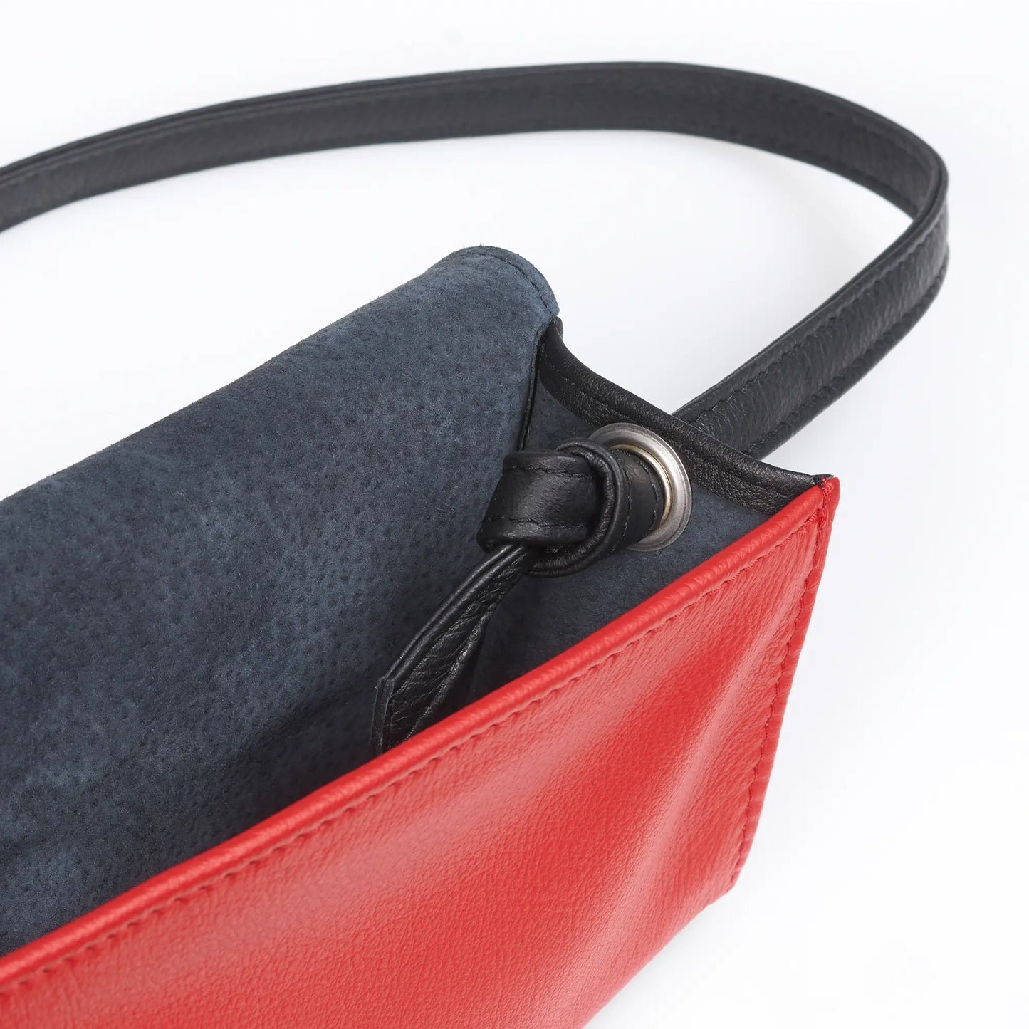 Piccolo Cross Body und Clutch